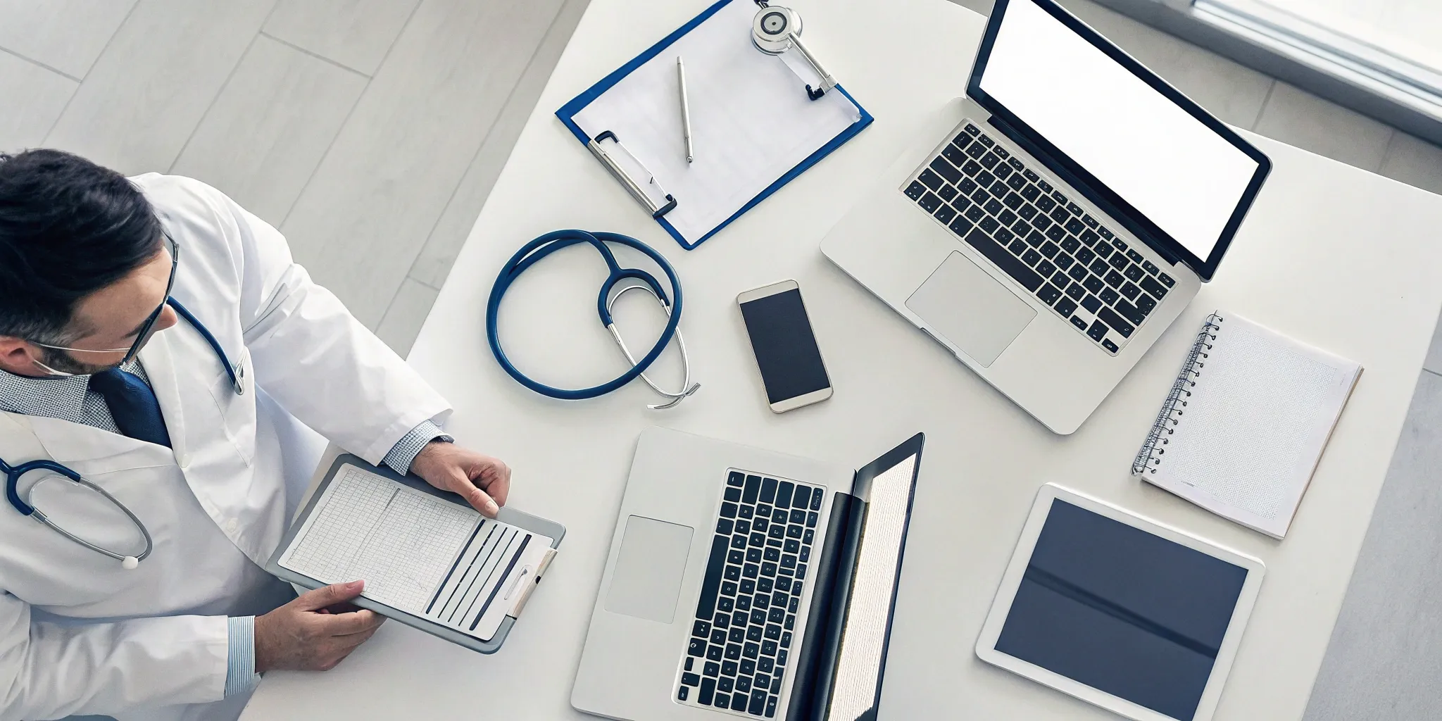 A doctor handles the details of outsourced AED program management, ensuring compliance and readiness.